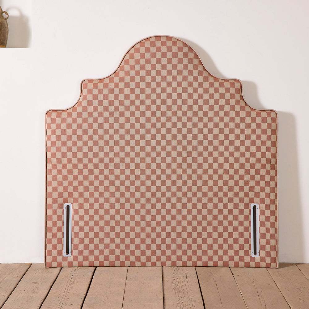 The Floks Mantel headboard, shown in full view.  Hand Upholstered in a range of luxurious fabrics.