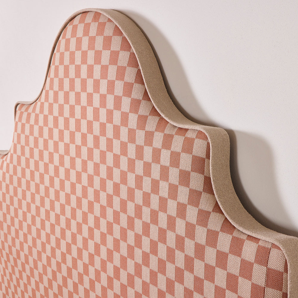 The Floks Mantle headboard, shown in a side profile view with a contrast bordered edge.