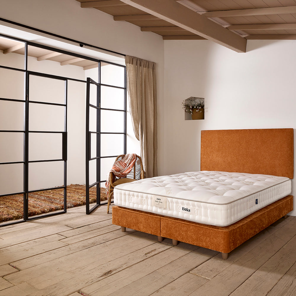 The Bertie Bed in Oxford Spice showing a side profile complete with a Floks luxury wool Mattress