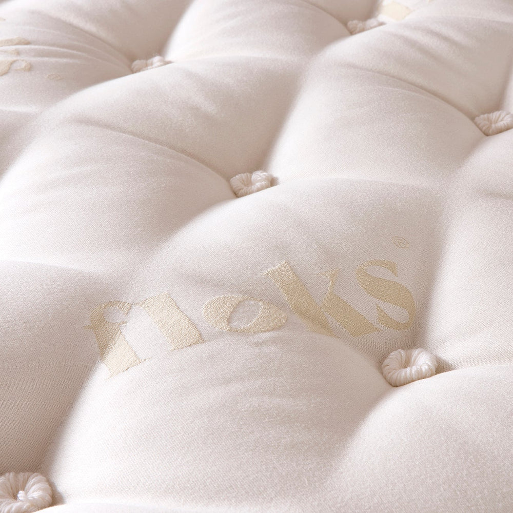 Close-up details of the top of the Perfectly Floks 5750 Mattress made from UK-certified wool and pocket springs, offering a cooling, supportive, and breathable sleep solution designed to transform the way you rest.