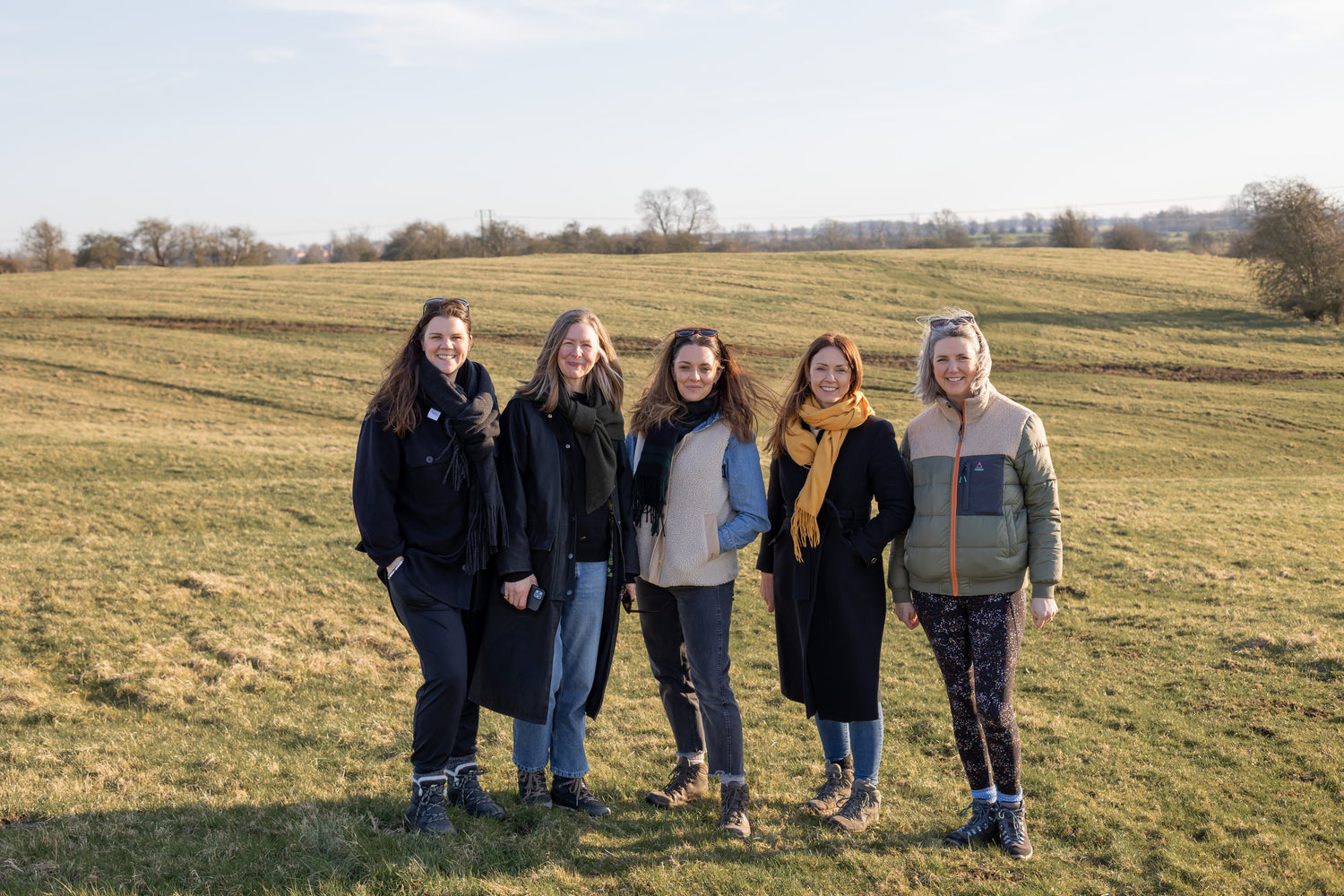 team Floks standing in a field